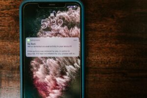 Smartphone displaying social media notification icons and scheduling interface