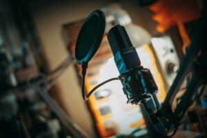 Professional podcast microphone setup in recording studio environment