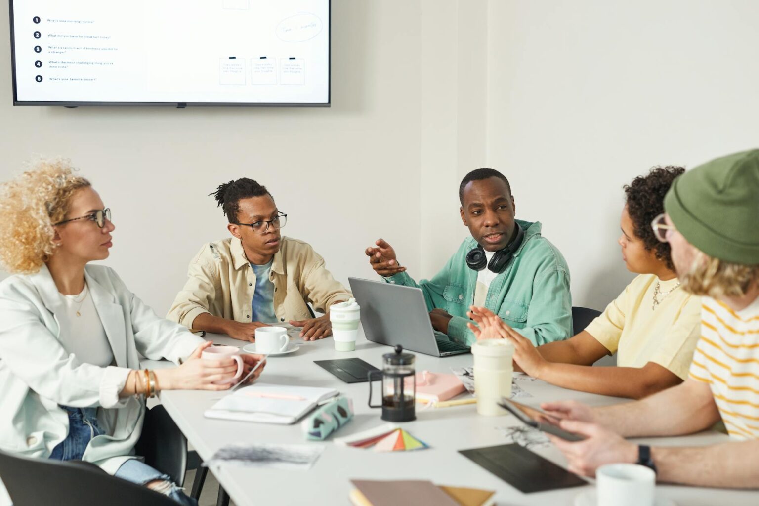 Professional team collaborating around a conference table during a productive meeting