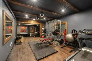Modern gym interior with exercise equipment and open workout space