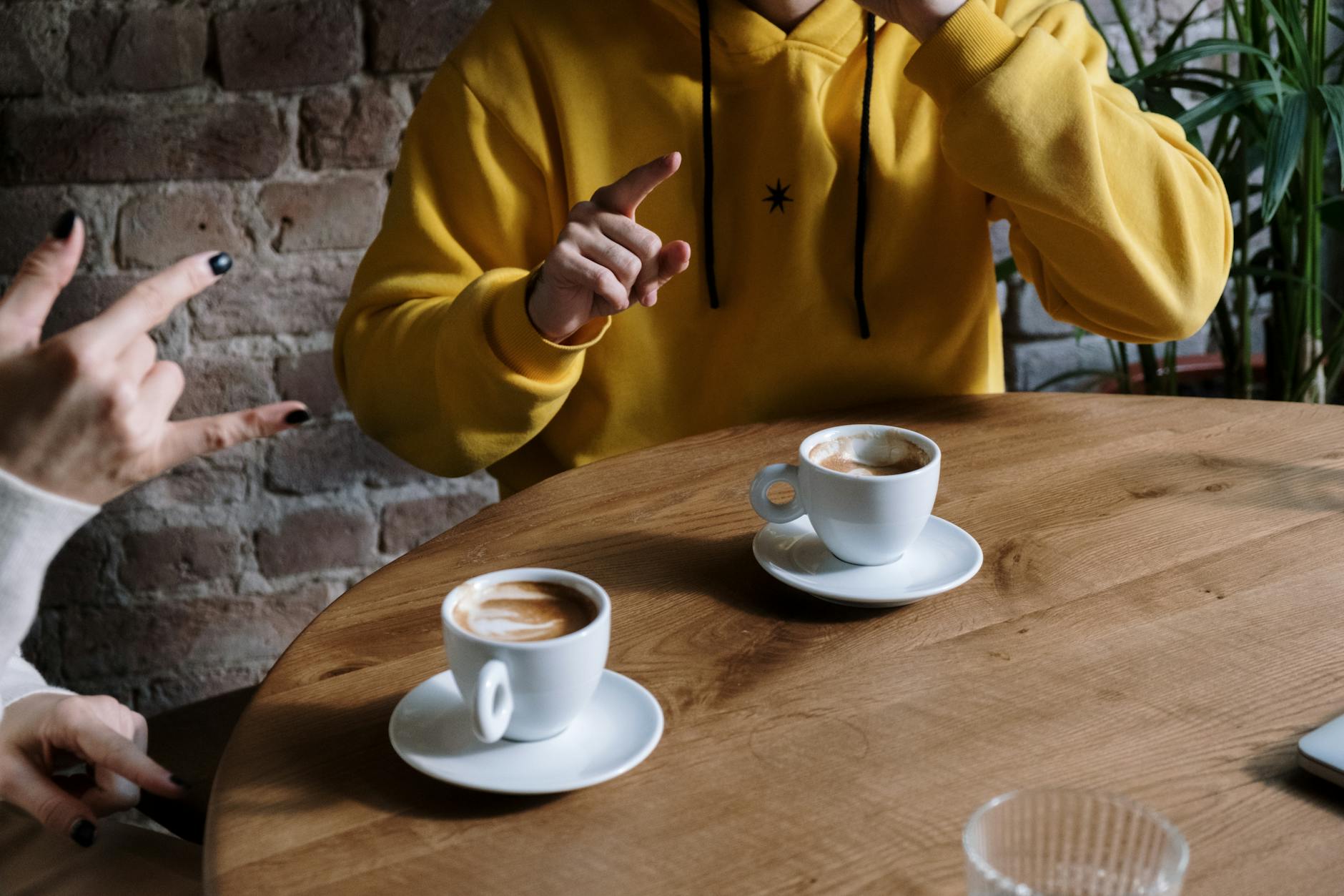 People gathering and socializing in a local coffee shop interior