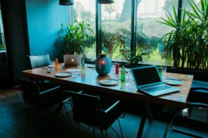 Professional working on laptop reviewing LinkedIn content strategy at a desk