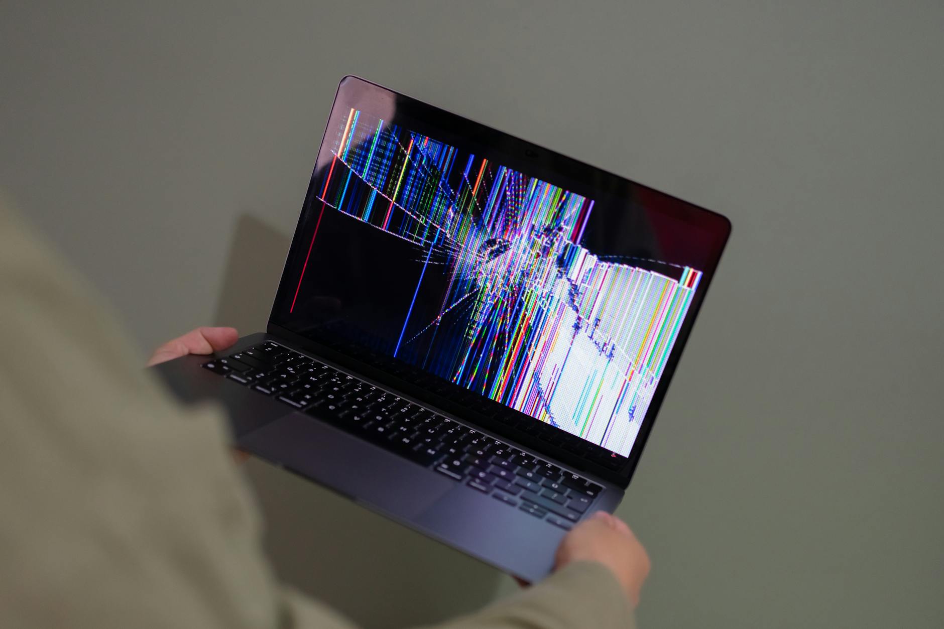 Person filling out an online form on laptop computer screen