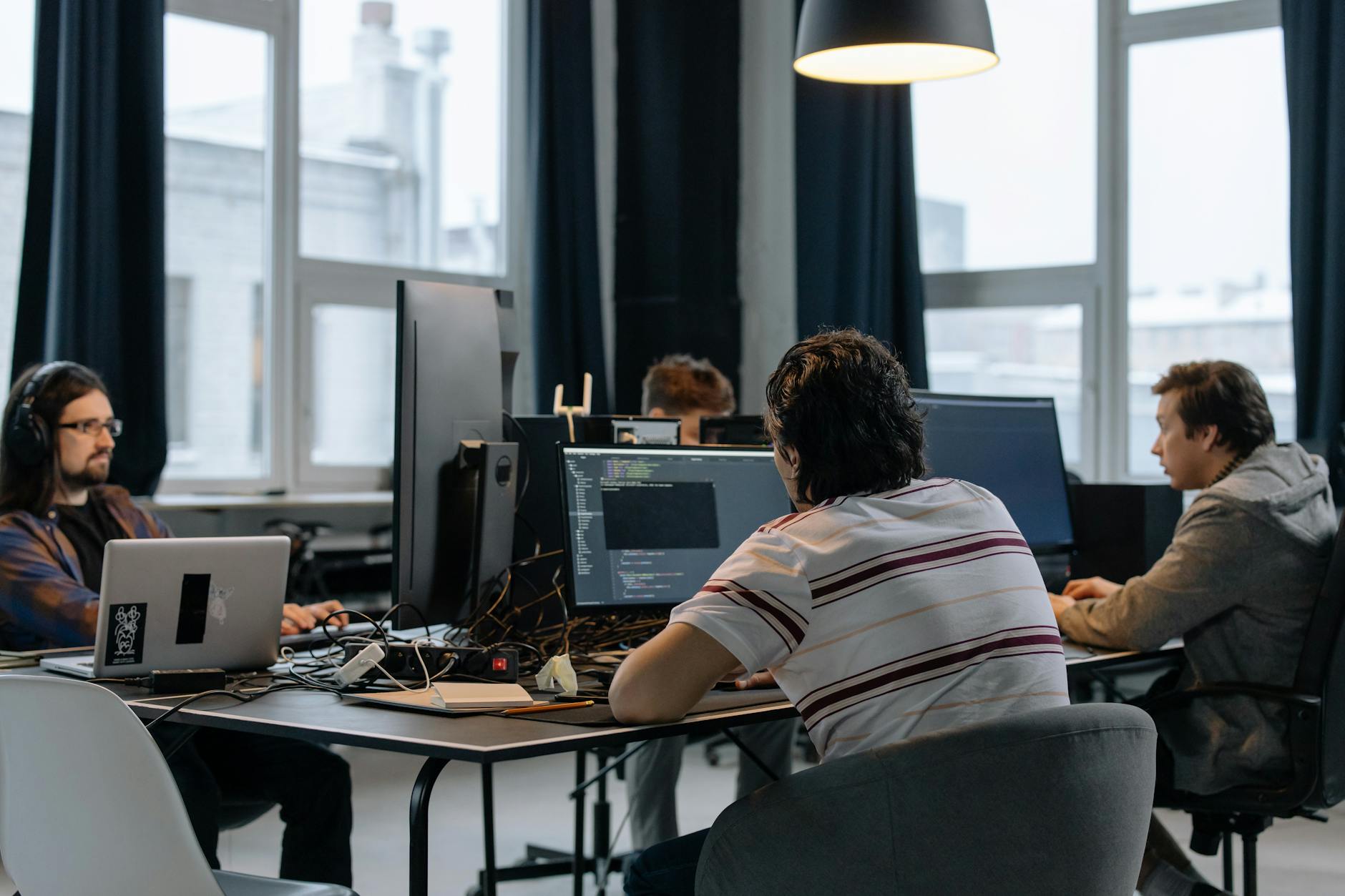 Business team members collaborating around a table in a modern office