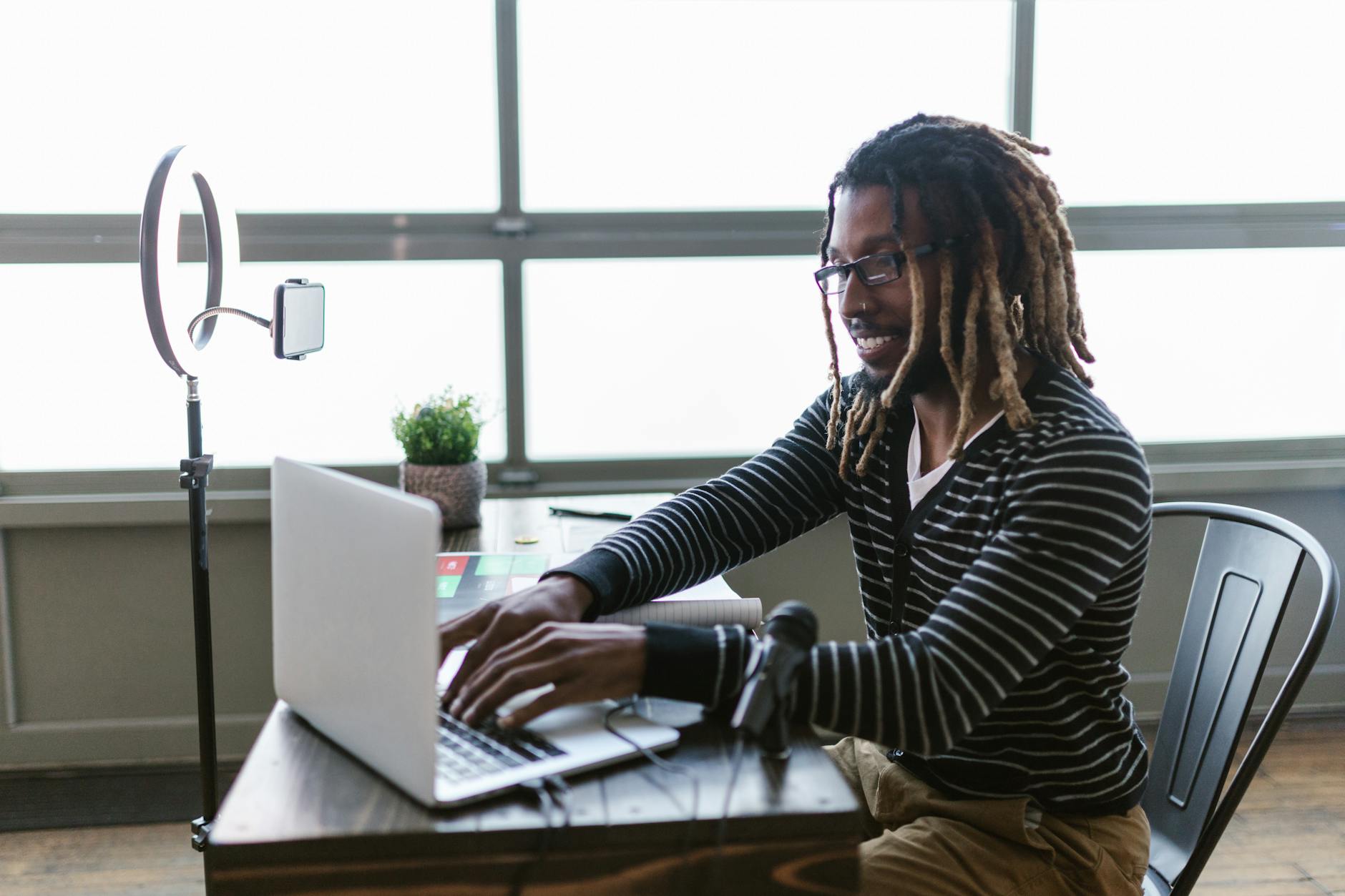 Content creator researching trends on a laptop computer