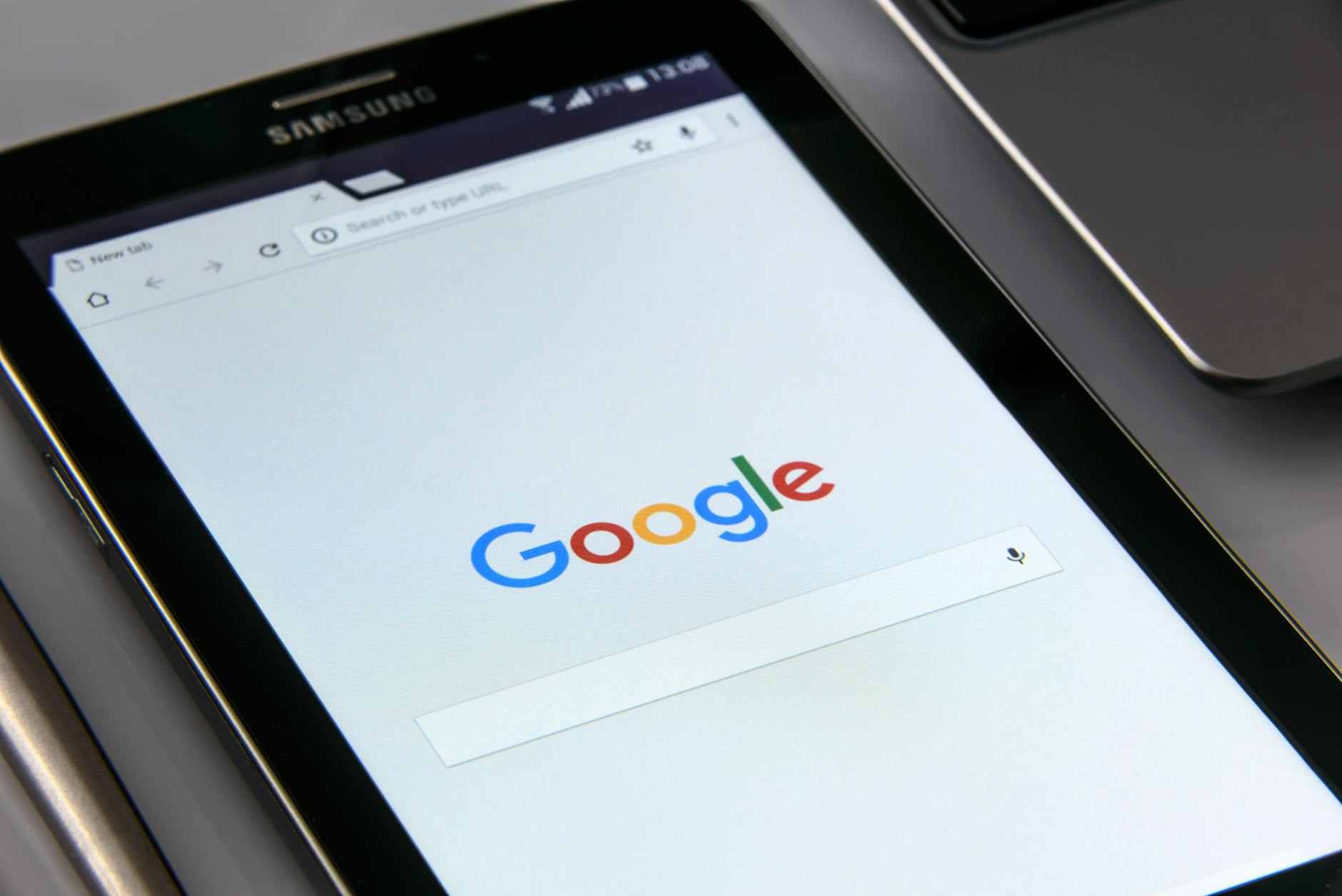 A person browsing trending topics and search results on a desktop computer