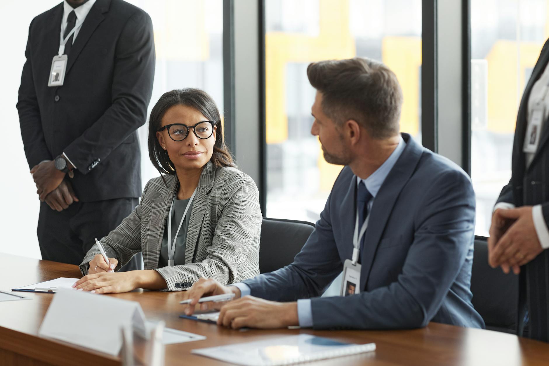 Professional business team reviewing reports and analytics during office meeting