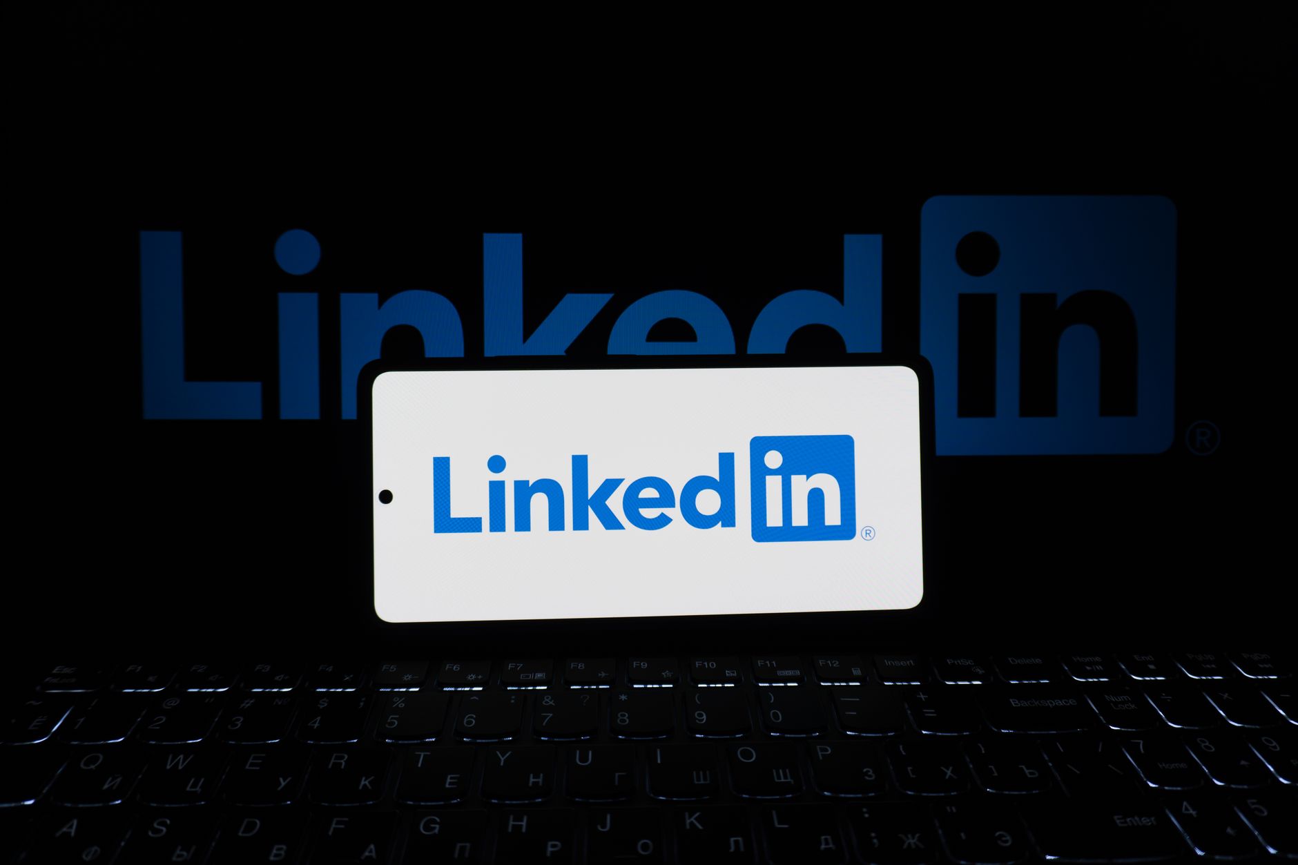 Person using LinkedIn on a laptop during a virtual event