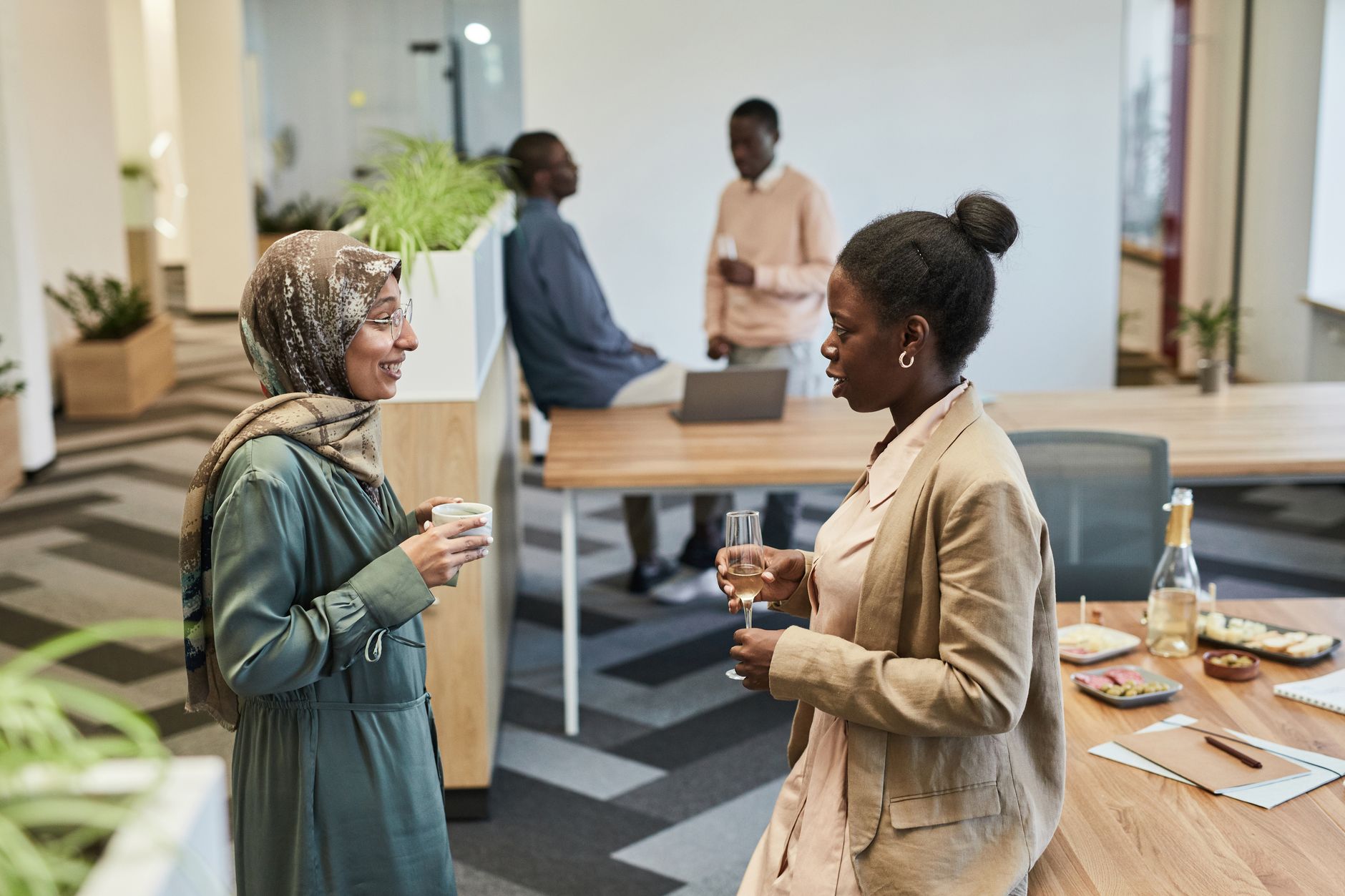 Two professionals collaborating in a modern office environment