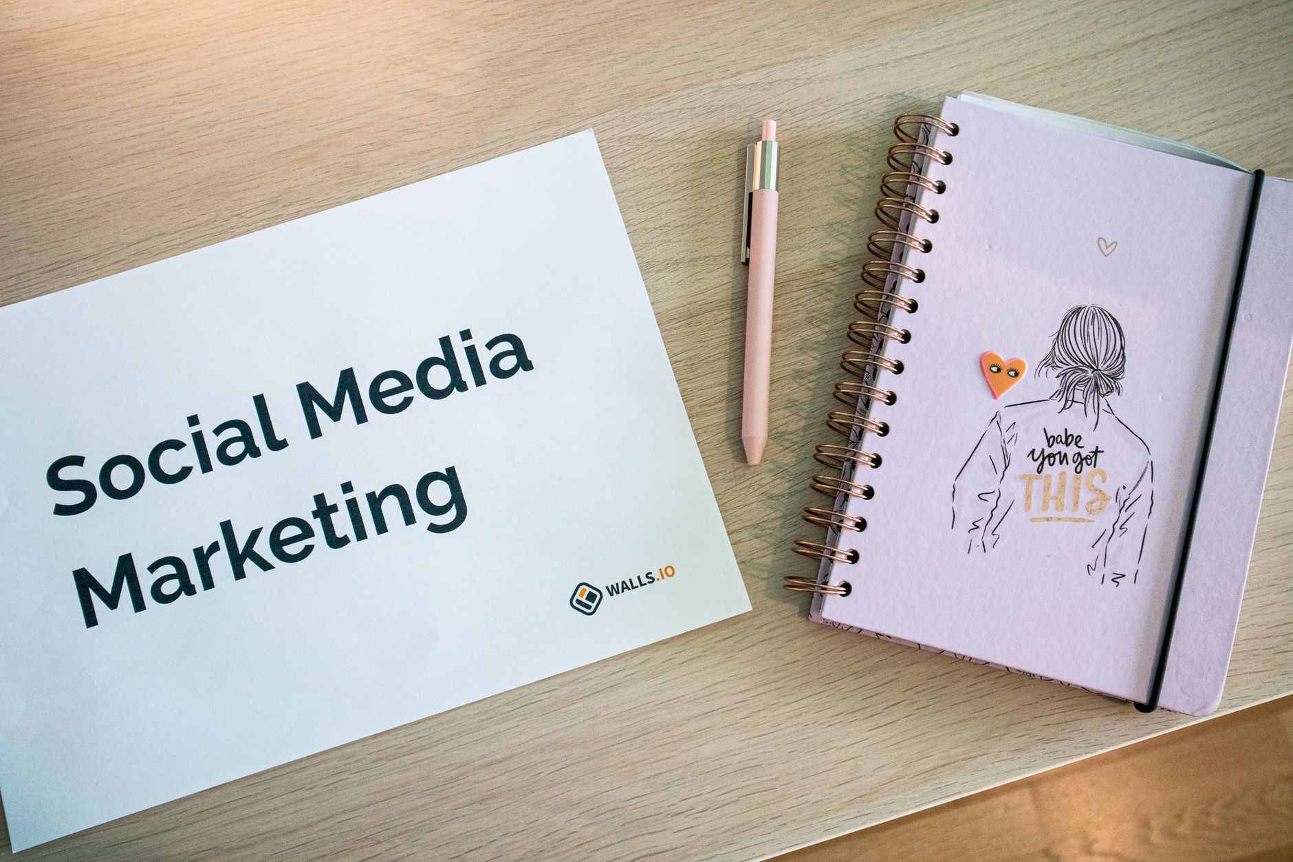 A professional reviewing social media marketing content on a screen
