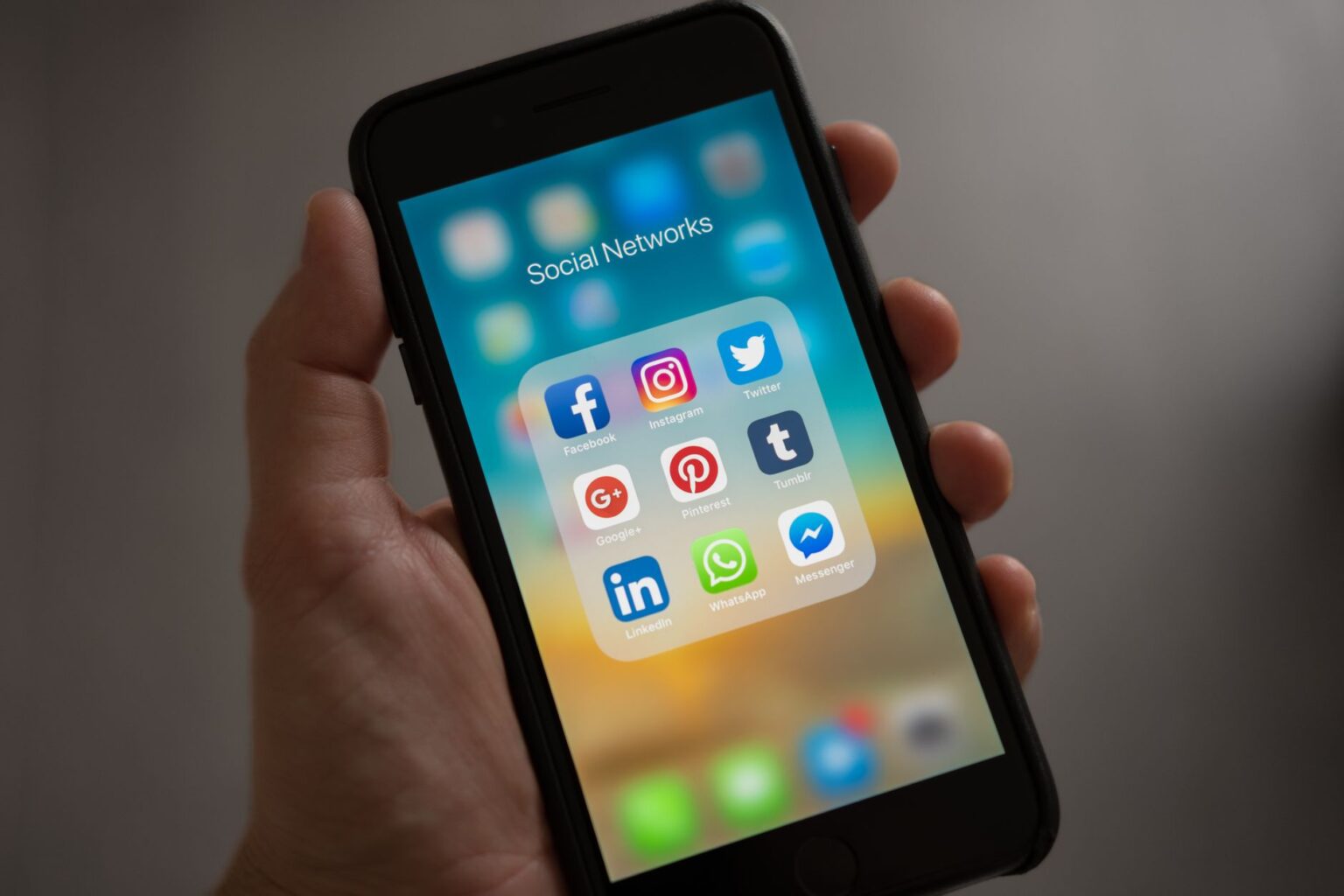 Person scrolling through Instagram messages on a smartphone