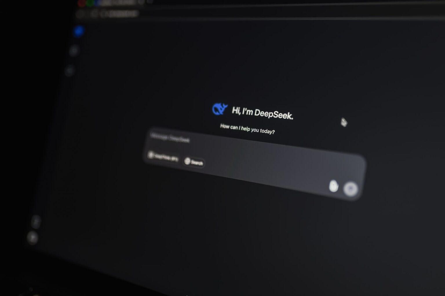 A person using an AI-powered search interface on a laptop screen