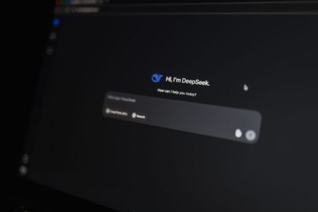 Perplexity’s Pages Feature Is Quietly Replacing Social Media Landing Pages A person using an AI-powered search interface on a laptop screen