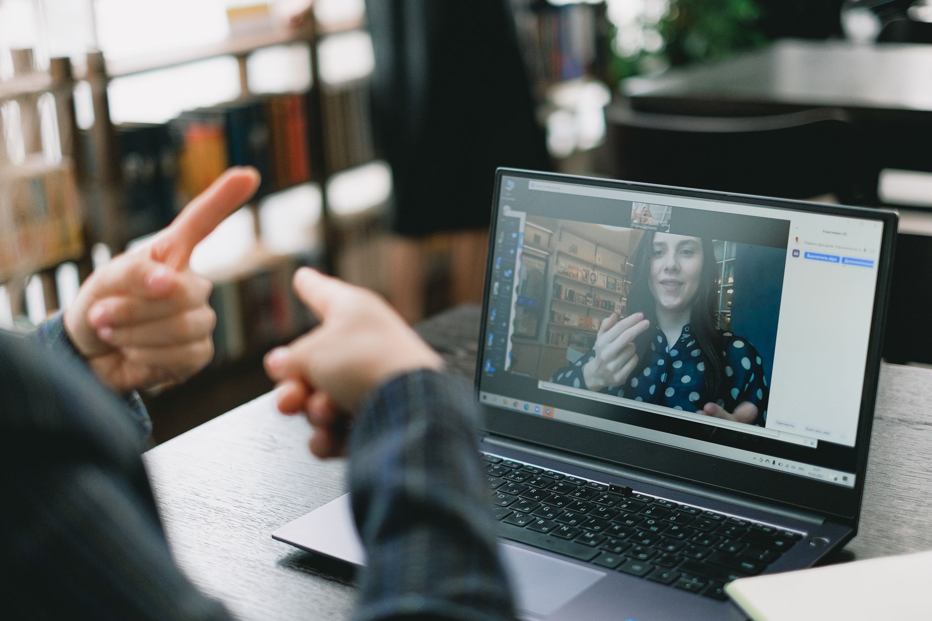 Person browsing an online community or video platform on a laptop screen