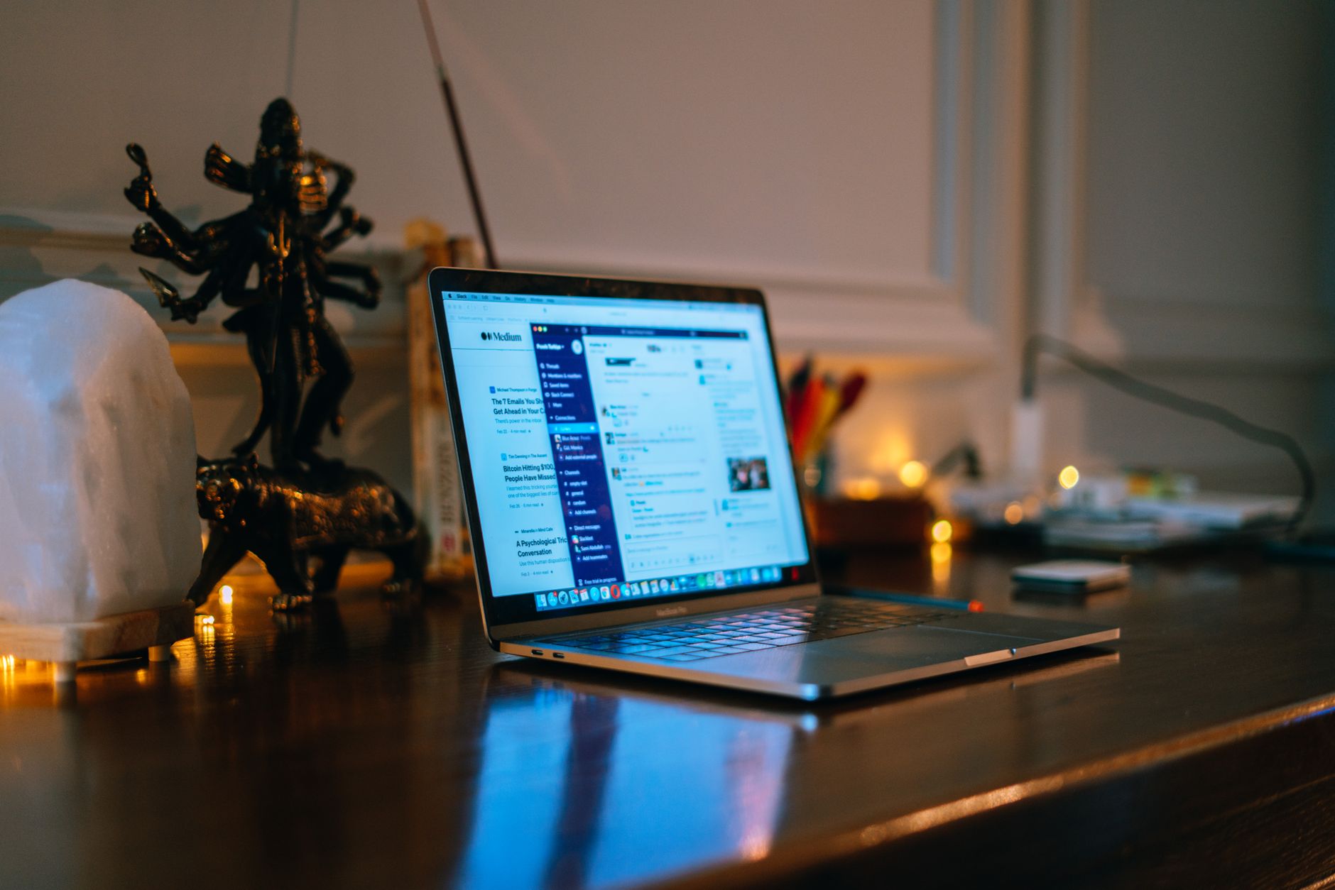 A clean digital workspace showing multiple screens with design and productivity tools open