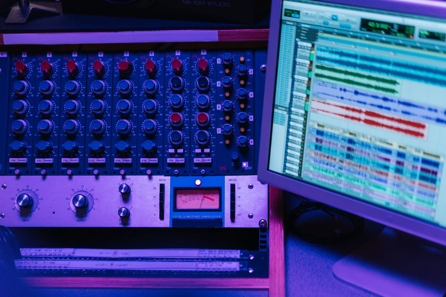 Close-up of audio editing software on a computer screen in a studio