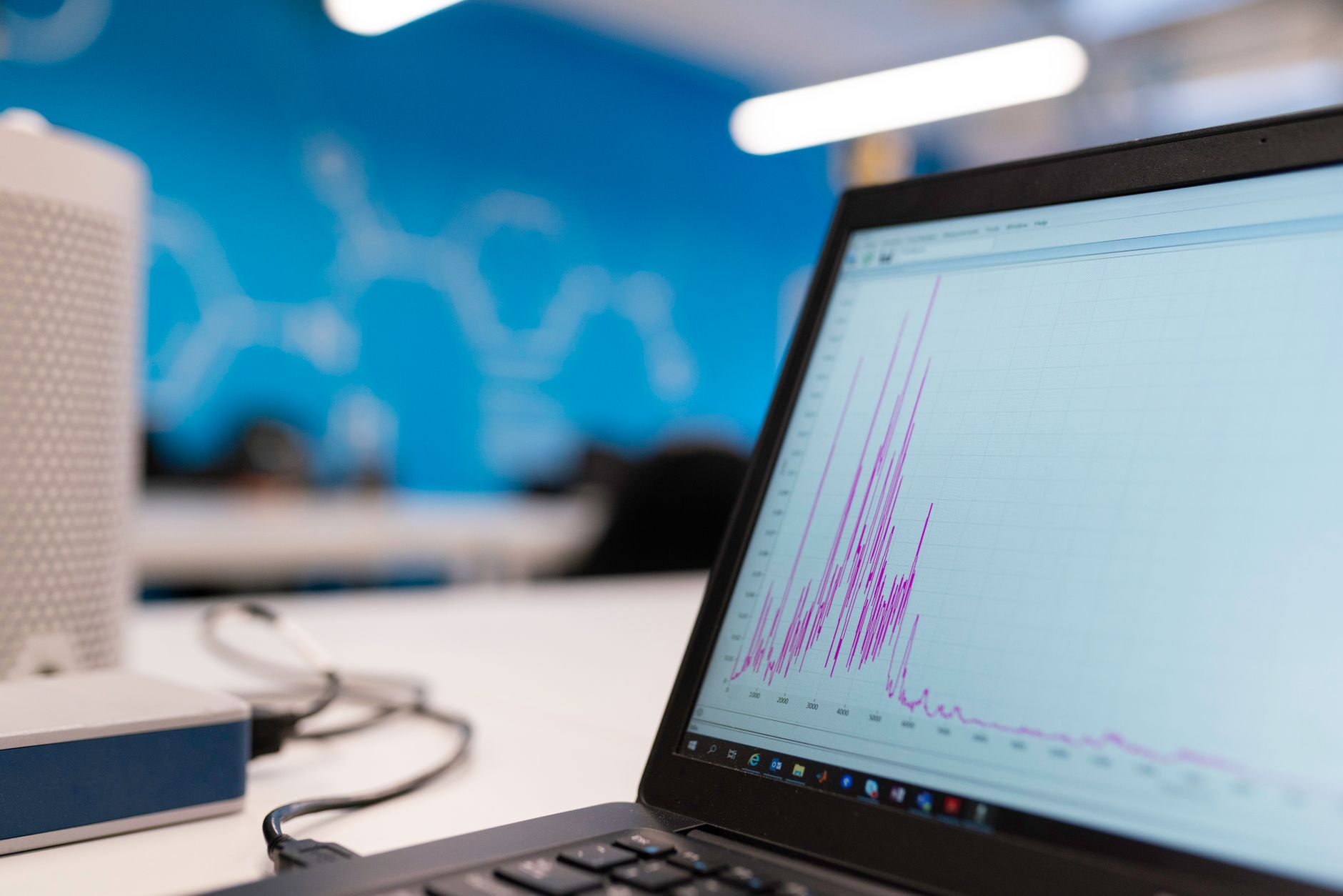 A laptop screen displaying data and analytics dashboards used for outbound marketing