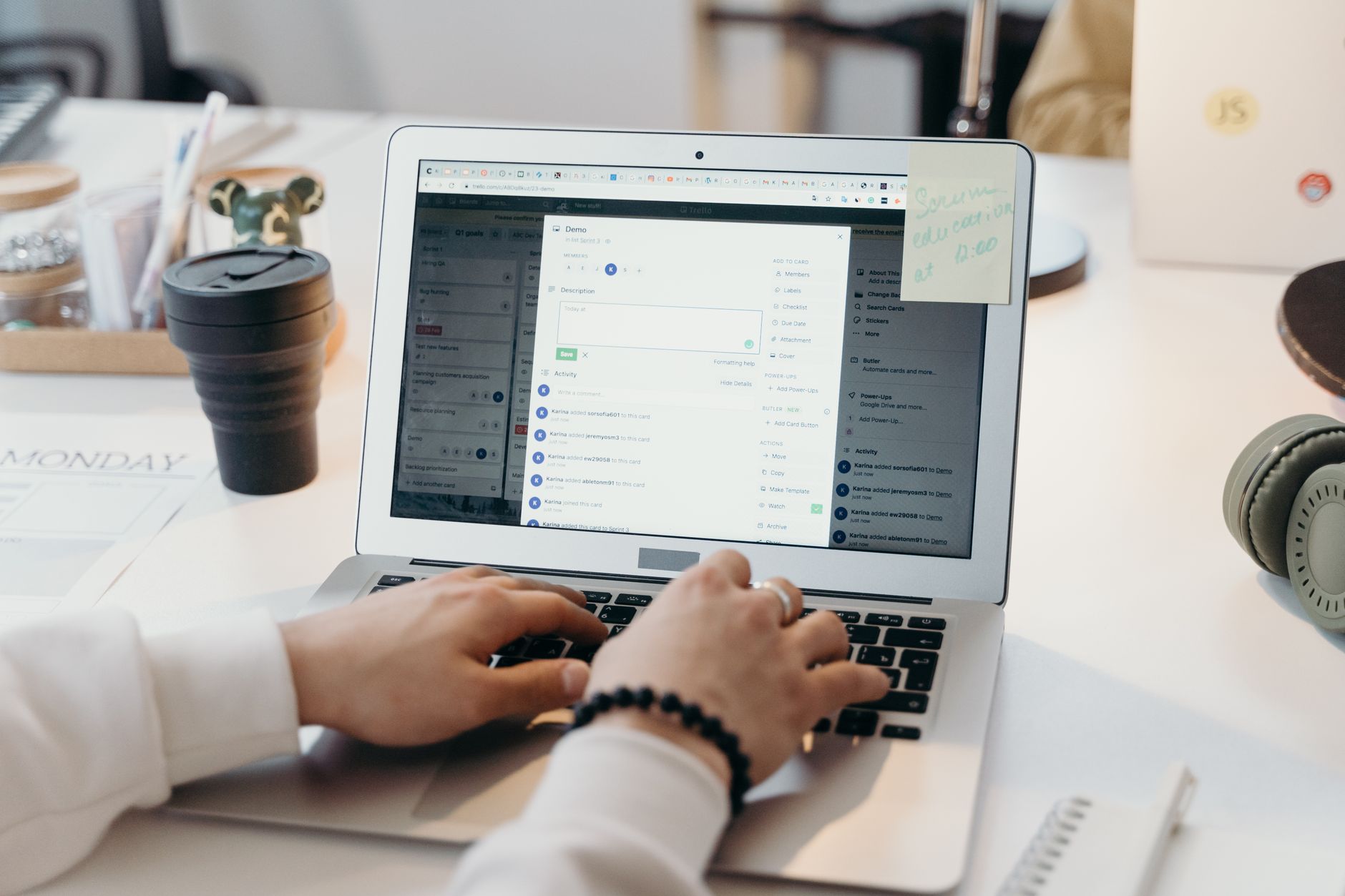 A person reading newsletter emails on a laptop at a desk, representing newsletter growth strategy