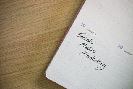 A visual content calendar displayed on a laptop screen for social media planning
