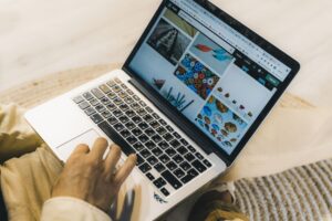 Designer working on a website layout on a desktop screen