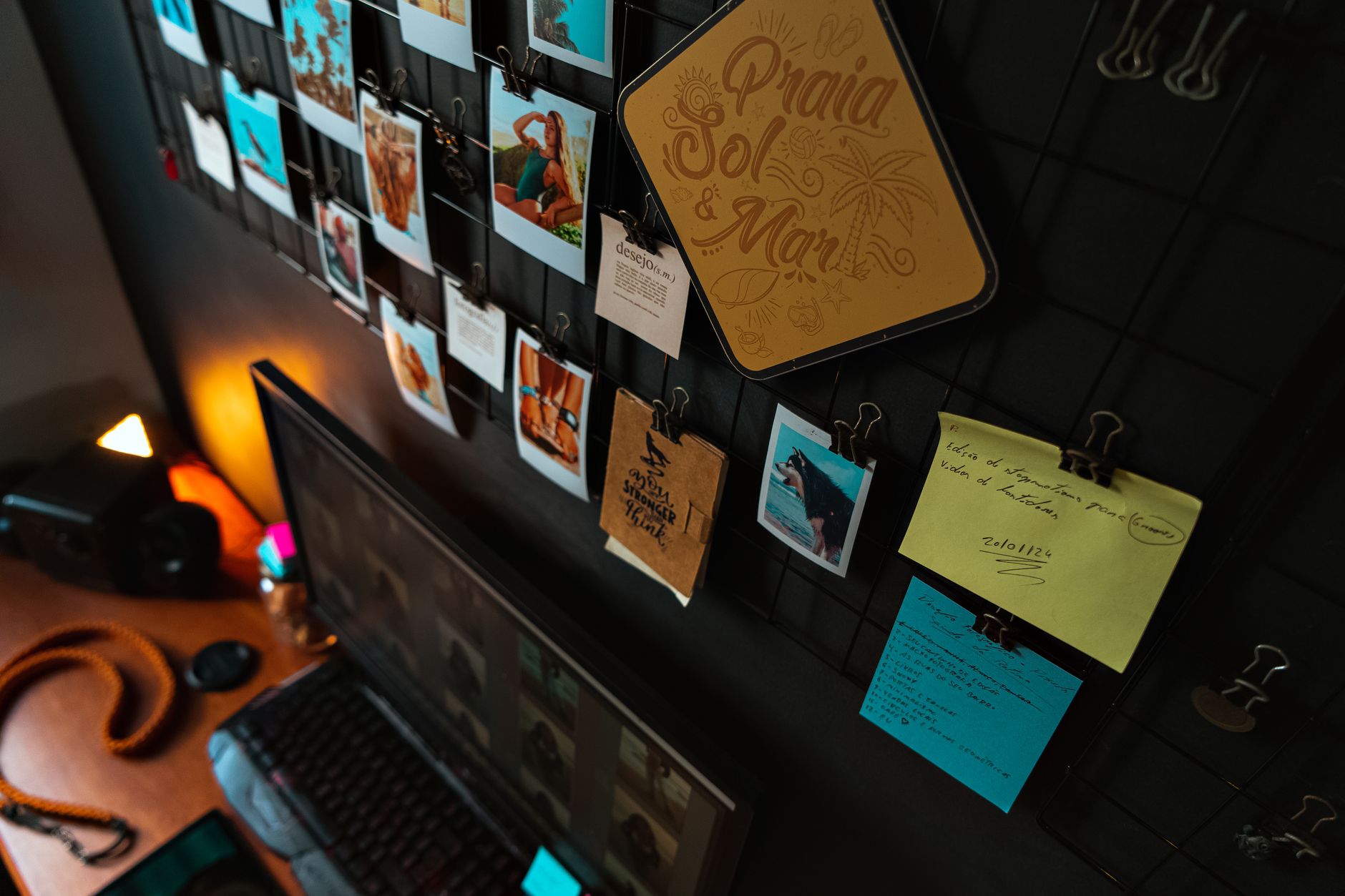 Person working on a digital workspace with notes and project documentation on screen