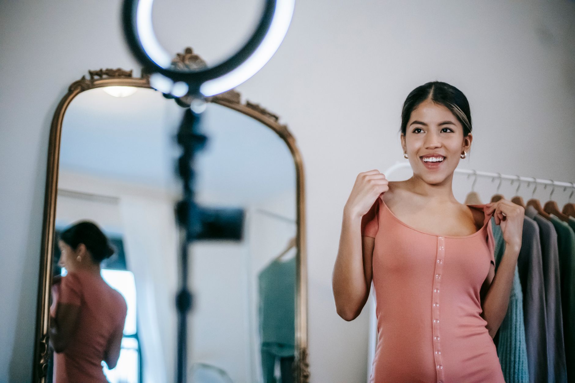 Content creator filming a vertical video for Instagram Reels on a smartphone