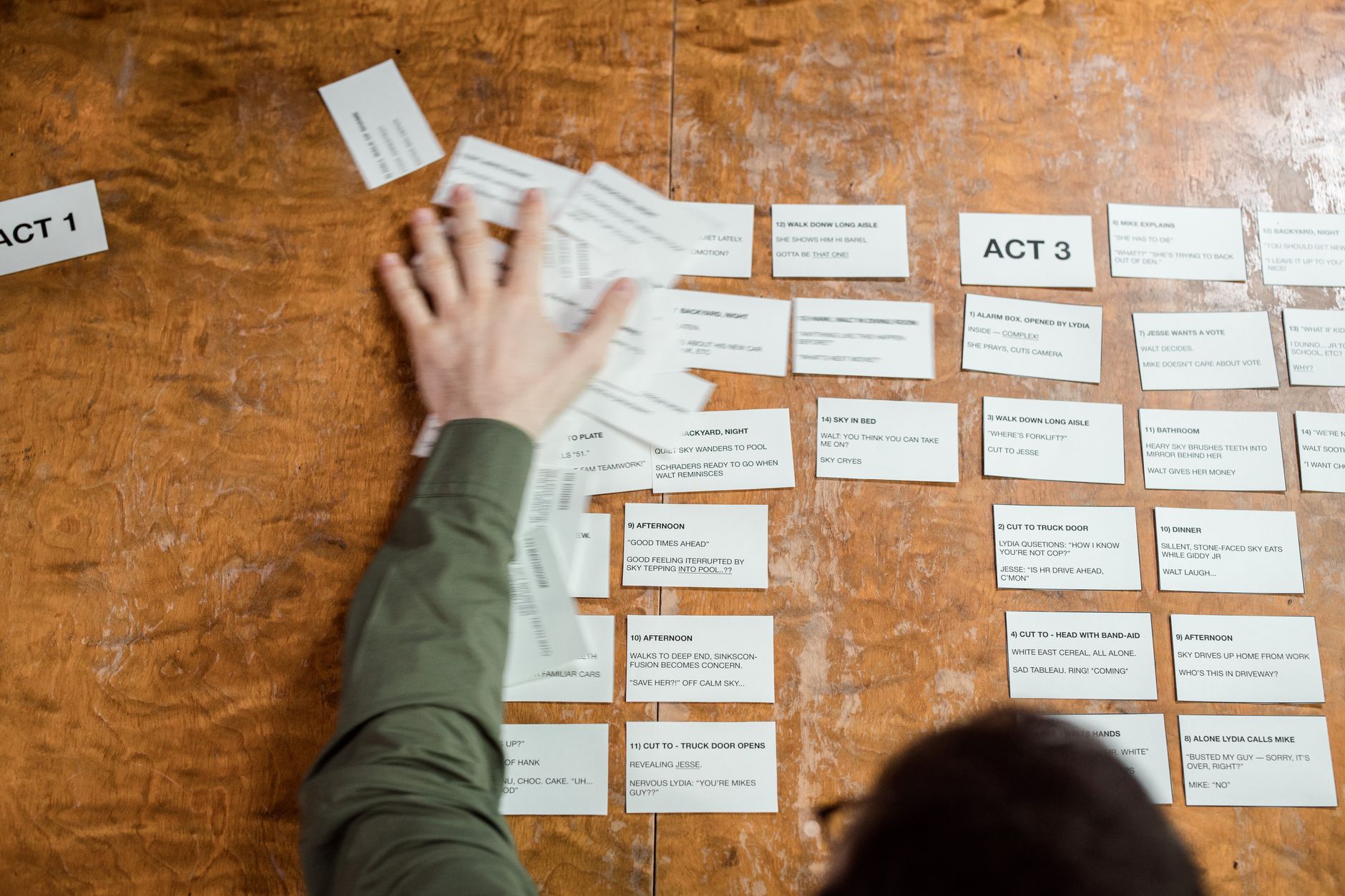 Creative professional reviewing a storyboard layout on a desk