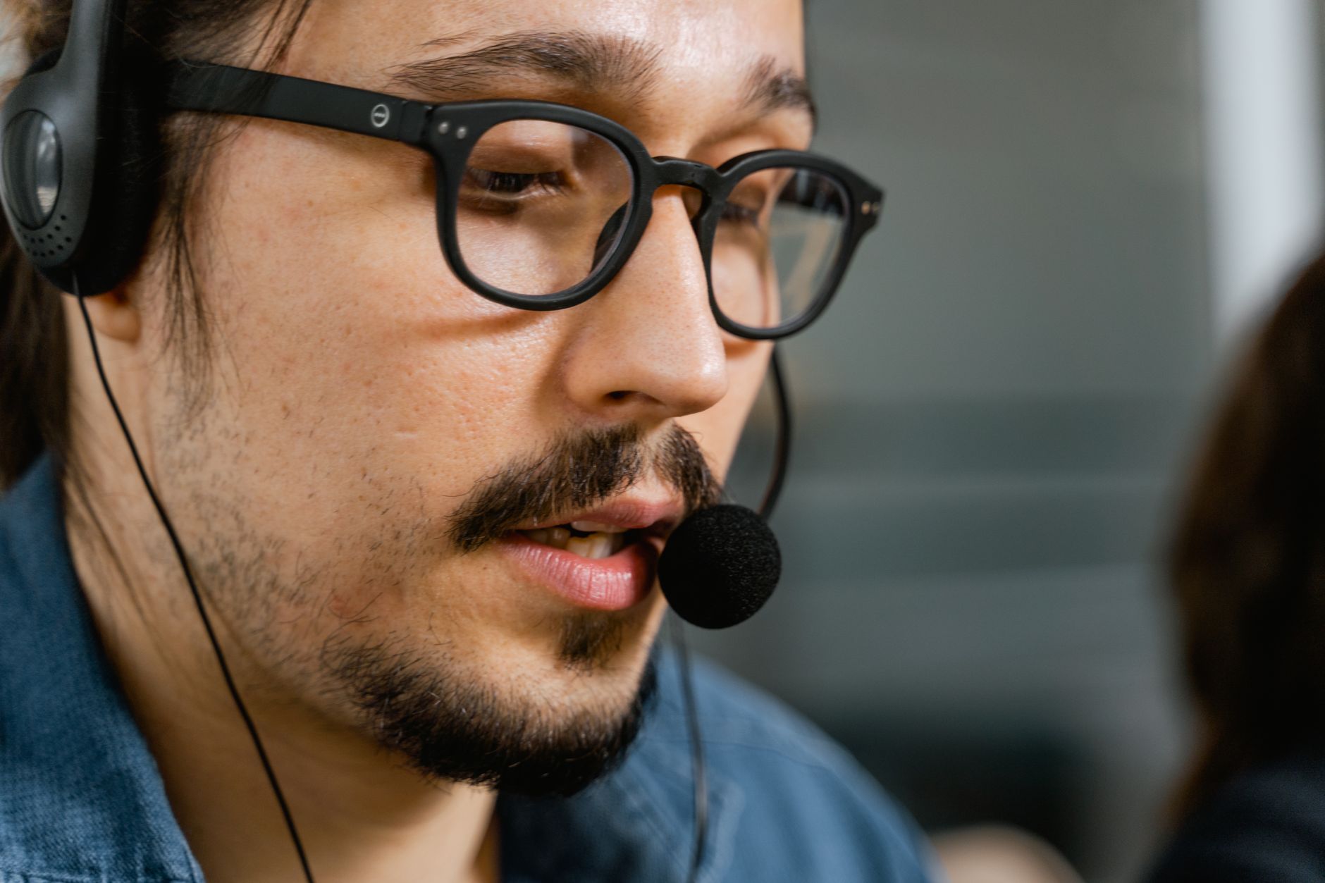 Close-up of a professional microphone used for voice recording and AI voice cloning