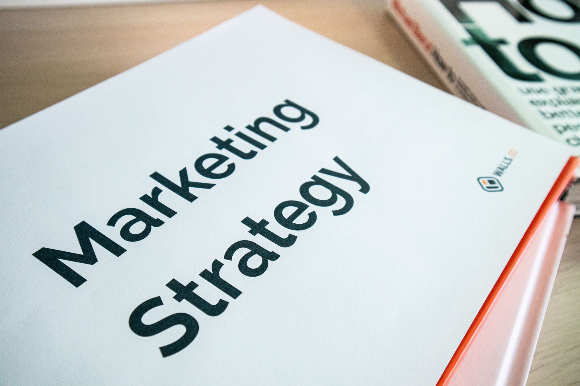 A marketer reviewing a content calendar and planning social media strategy