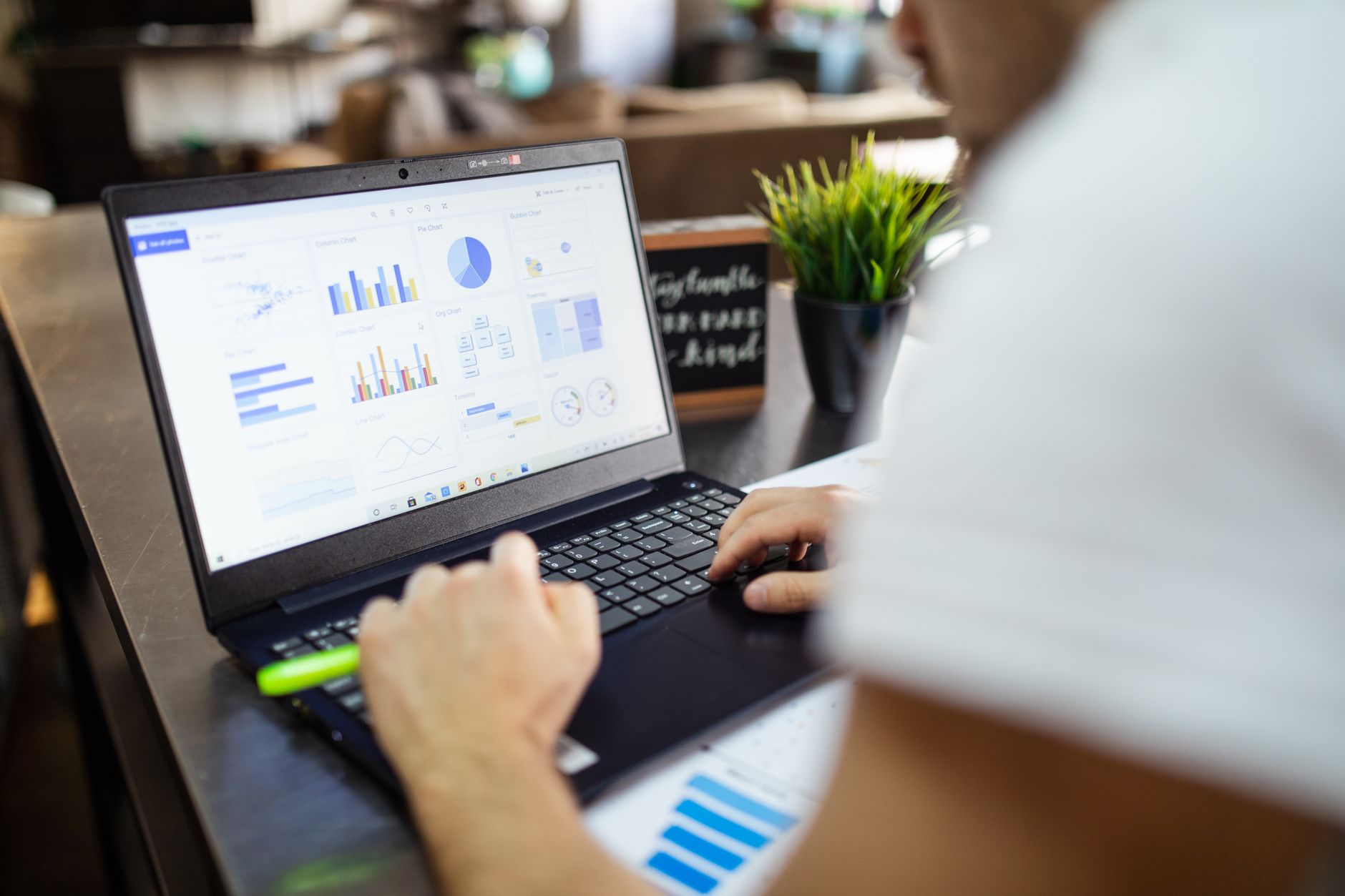 Person reviewing scraped contact data on a laptop screen for LinkedIn outreach