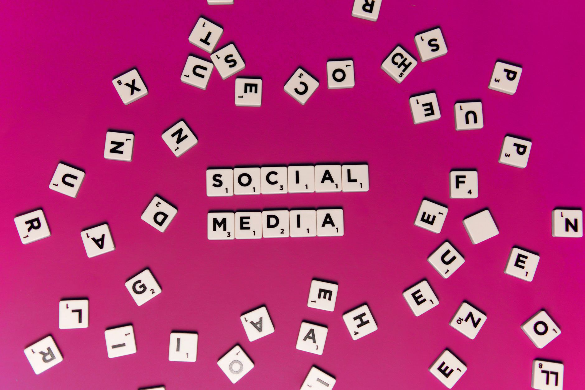 Person reviewing social media advertisement performance on a laptop screen