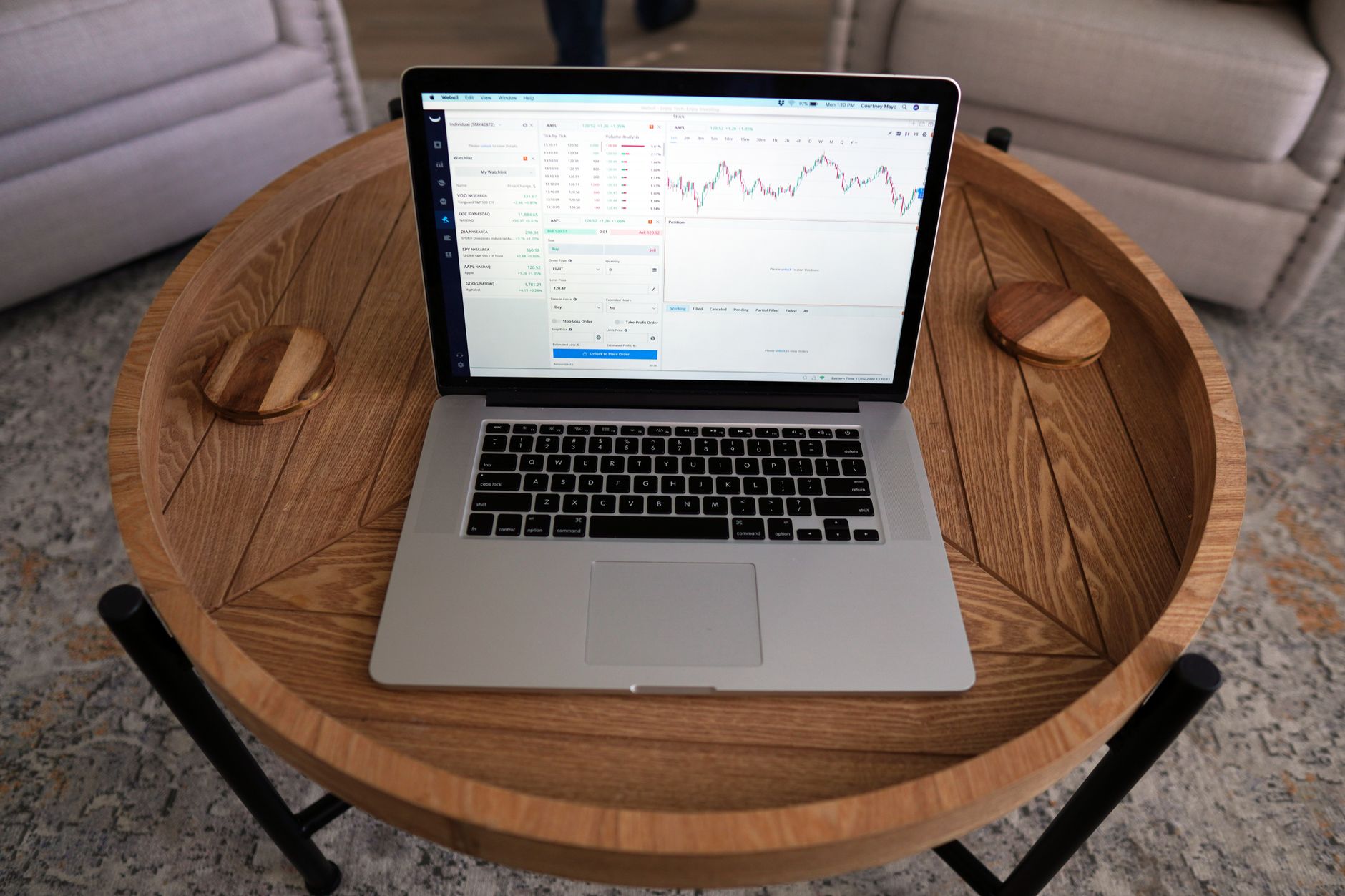 Marketing professional reviewing link click analytics on a laptop screen