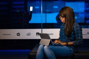 Lempod’s LinkedIn Engagement Pods Are Quietly Replacing Podawaa for B2B Teams Professional person using LinkedIn on a laptop for B2B networking