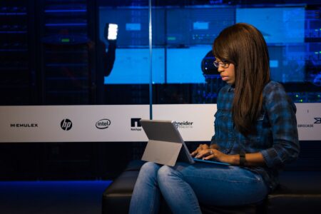 Lempod’s LinkedIn Engagement Pods Are Quietly Replacing Podawaa for B2B Teams Professional person using LinkedIn on a laptop for B2B networking
