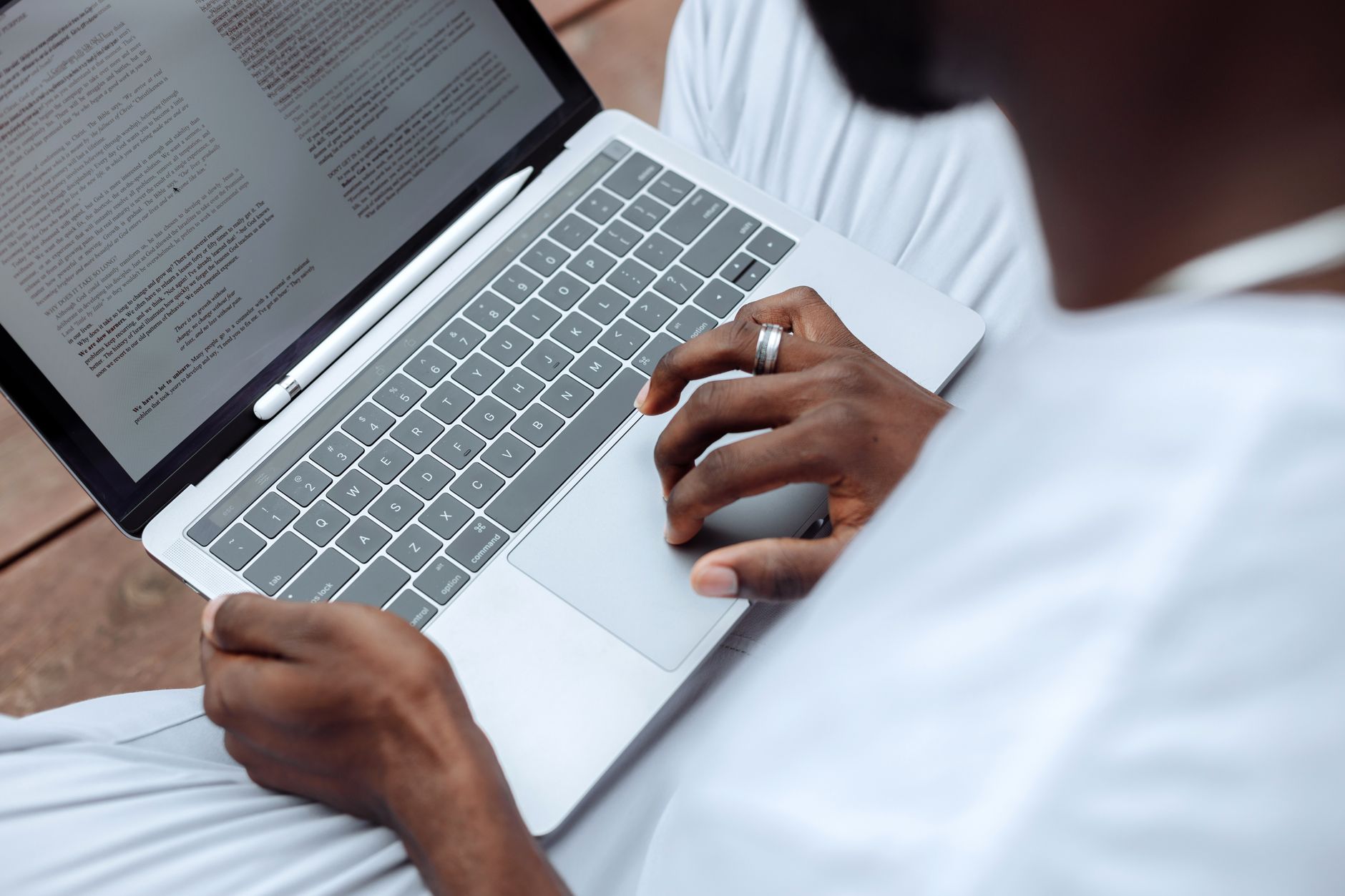 Professional content creator writing and planning content at a desk